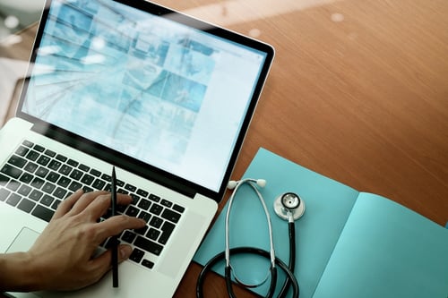 Integrated Healthcare | Stethoscope and Laptop